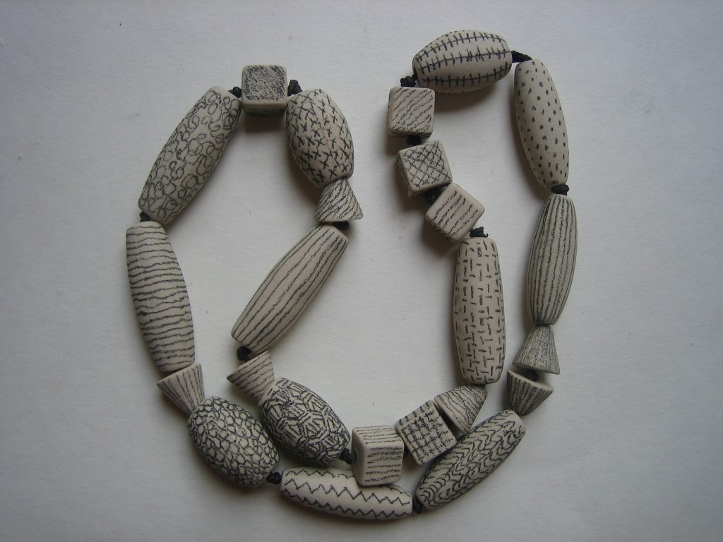 2009 stoneware, leather, 47cm