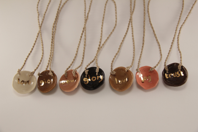 2012 'breastcancer pendant', porcelain, swarovsky, gold luster, o3cm, back